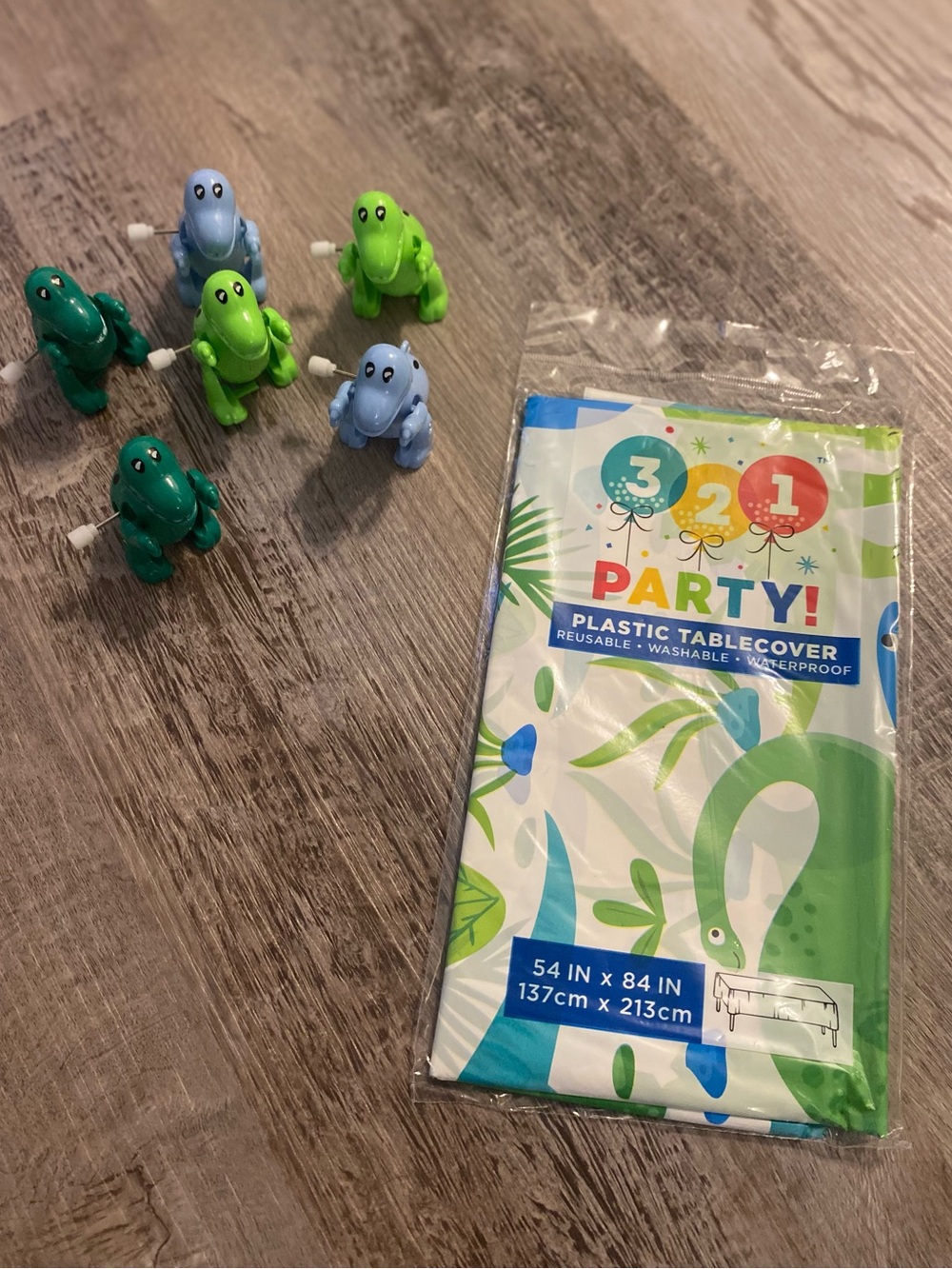 Birthday Dino Party Decor Set of 6 Wind up Dinosaurs & Plastic Tablecloth